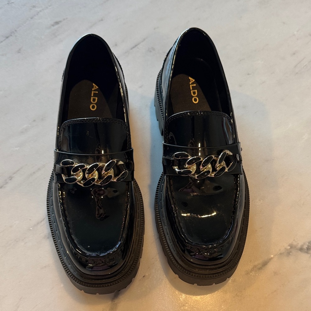 Aldo Glossy Black Loafers with Chain Accent